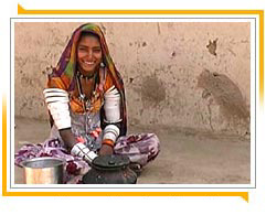 Woman Cleaning Utensils